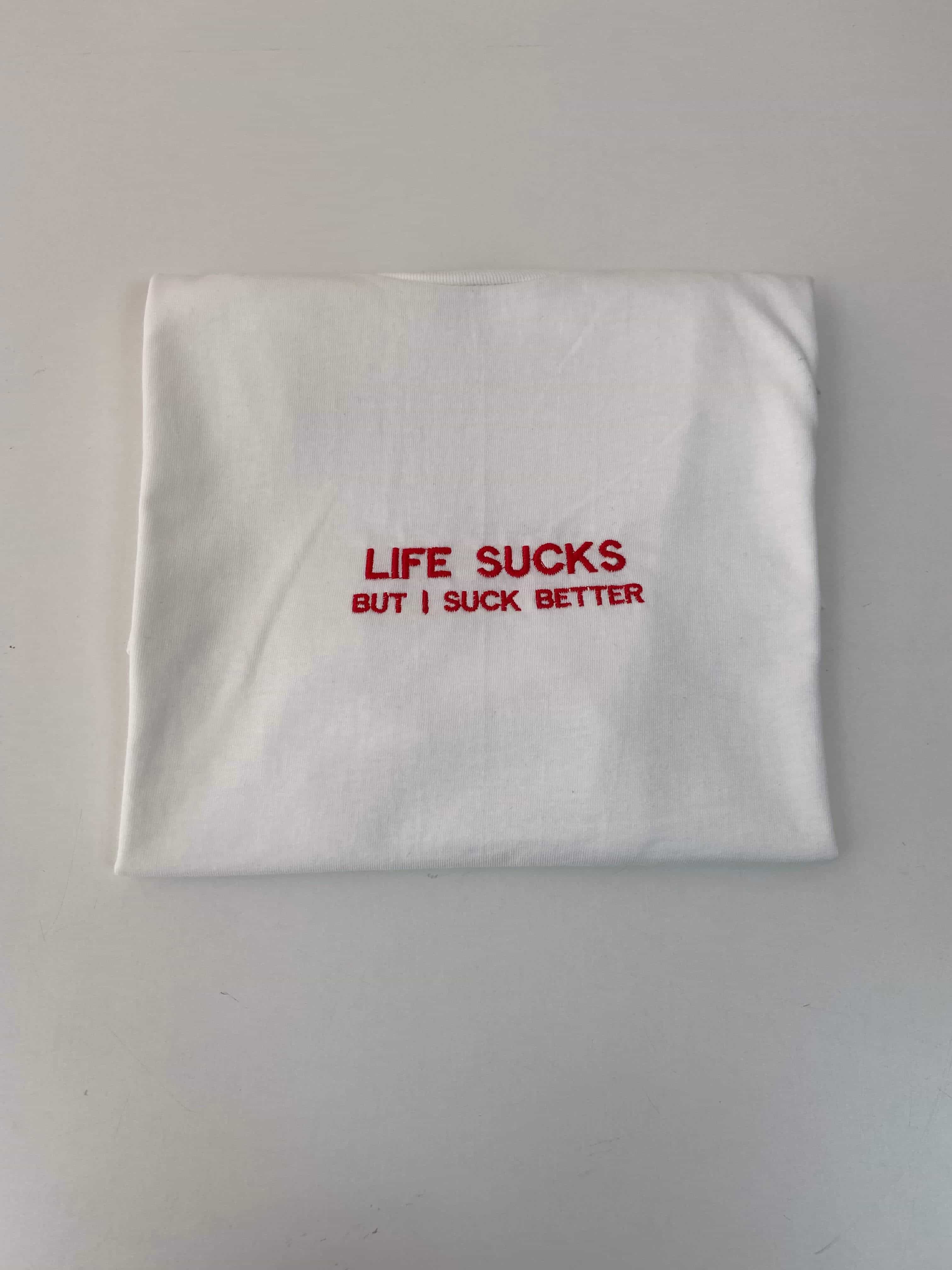 Life sucks but i suck better