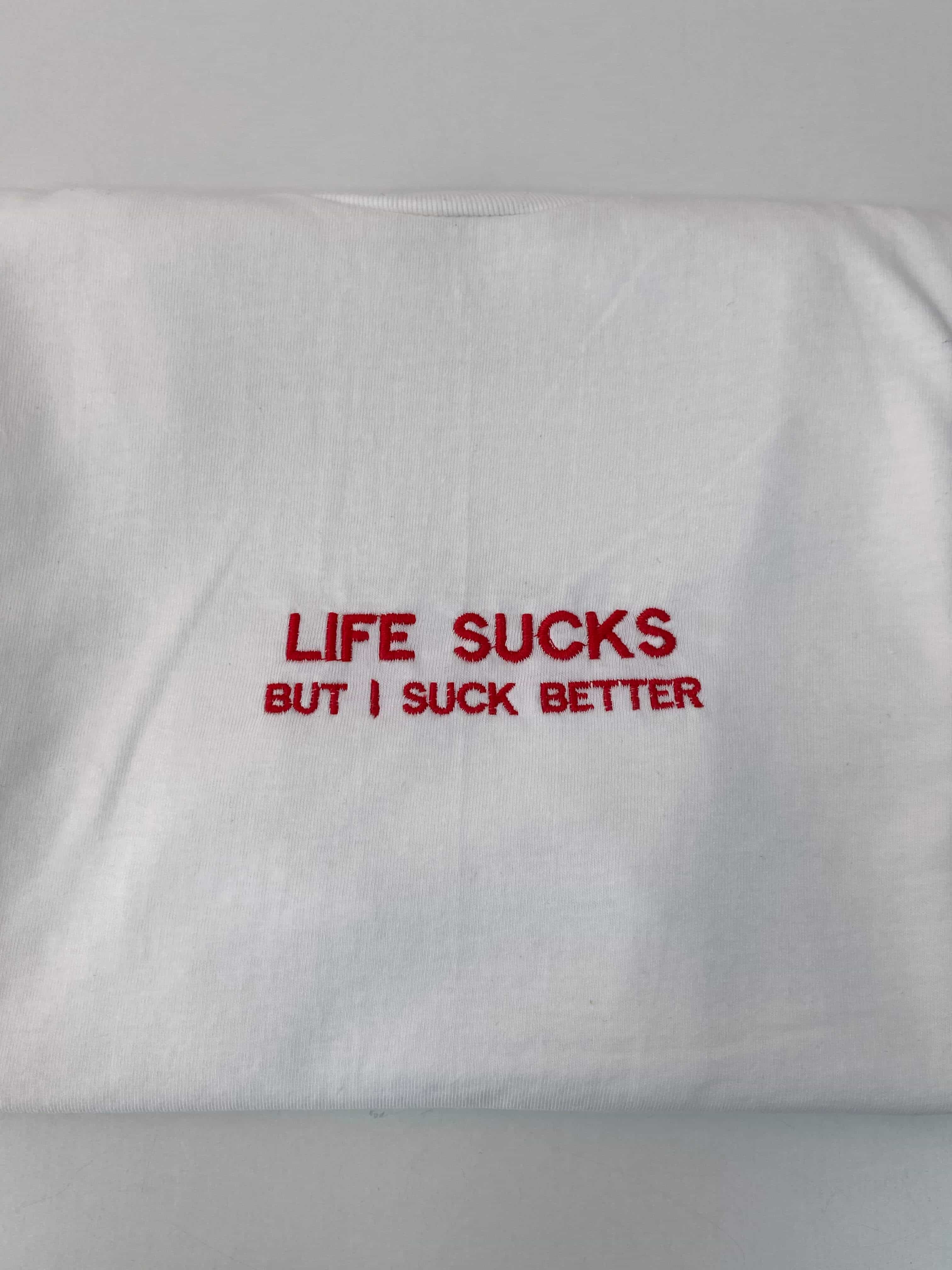 Life sucks but i suck better